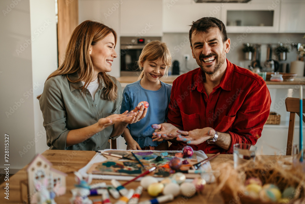 Loving family preparing for an Easter at home Loving family preparing for an Easter at home