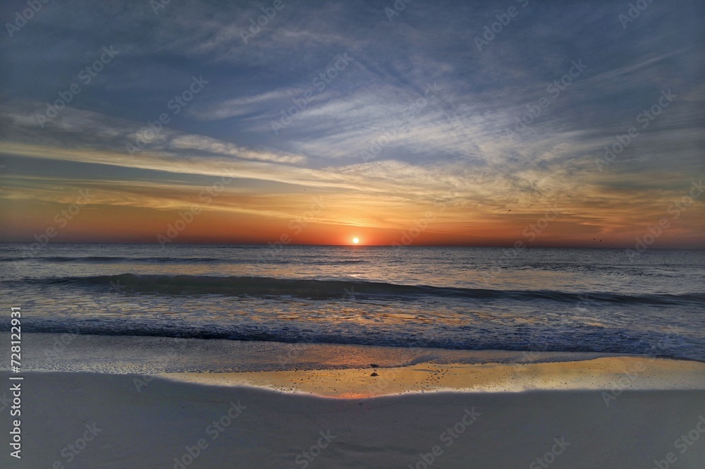 Panoramic view of the sun rising over the Atlantic Ocean Panoramic view of the sun rising over the Atlantic Ocean