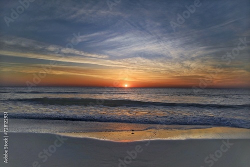 Panoramic view of the sun rising over the Atlantic Ocean