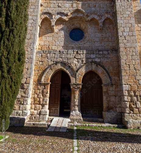 Western doorway of the Romanesque church of Santa Maria la Mayor (13th century). Villamuriel del Cerrato, Castile and Leon, Spain. photo