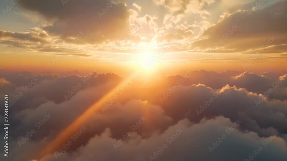 The setting sun near the horizon, sunlight piercing through clouds emitting strong rays, clouds enveloped in a warm hue by the soft light.
