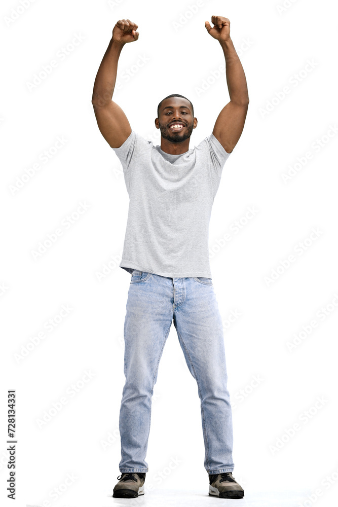 Fototapeta premium A man, full-length, on a white background, raised his hands up