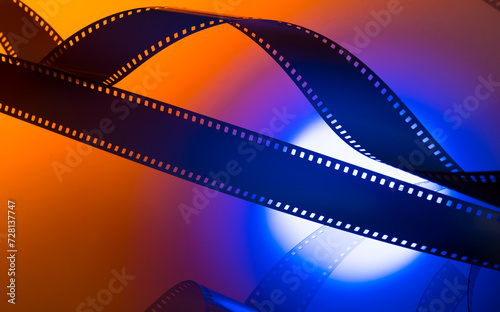orange blue cinema background with film strip