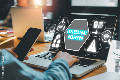 Exploratory research concept, Business woman working on laptop computer with exploratory research icon on virtual screen.