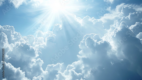 A ray of divine light shining through a cloud representing the enlightening and protective presence of angels. photo