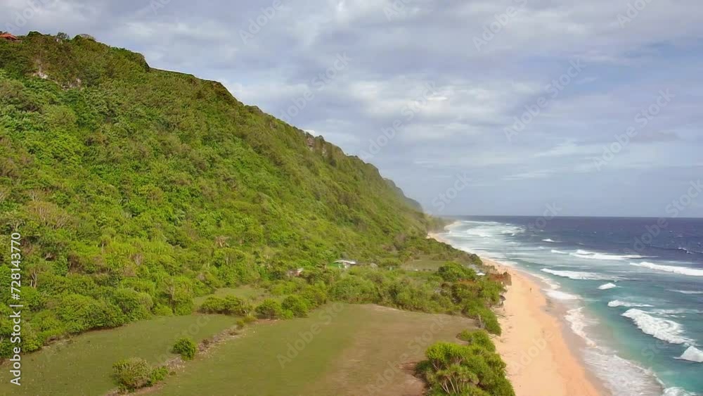Beautiful aerial view of the beach and ocean. Video of blue waves near the shore