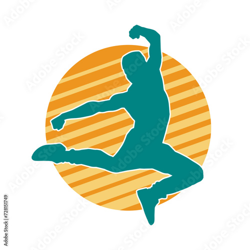 Silhouette of a sporty man jumping. Silhouette of a dancer male in action pose.