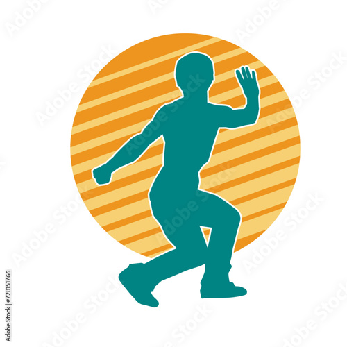 Silhouette of a man in oriental martial art pose. Silhouette of a male in martial art move.