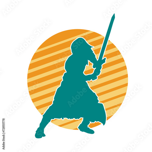 Silhouette of a male warrior in action pose with sword weapon. Silhouette of a man fighter carrying sword weapon.