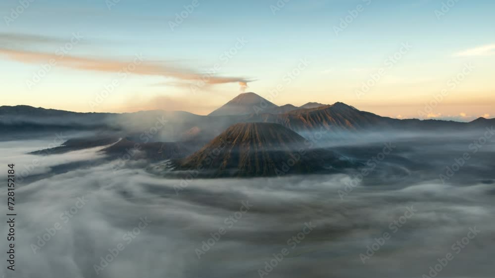 Mount Bromo with misty morning sunrise, Java island, Indonesia Mount Bromo with misty morning sunrise, Java island, Indonesia