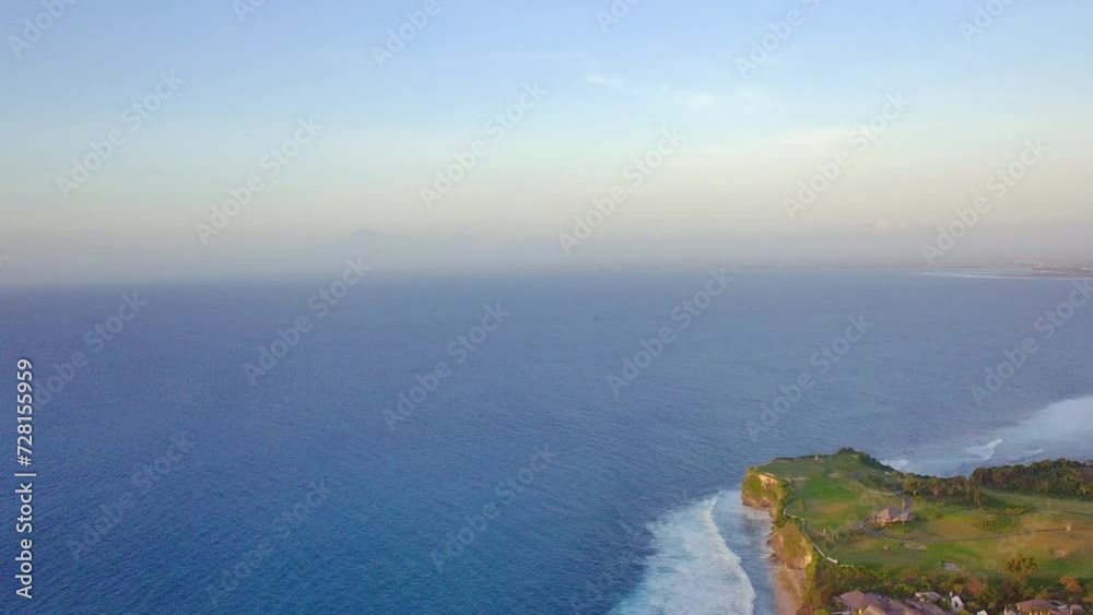Beautiful view of the blue surface of the water and the shore. Aerial to Ocean Vision Beautiful view of the blue surface of the water and the shore. Aerial to Ocean Vision