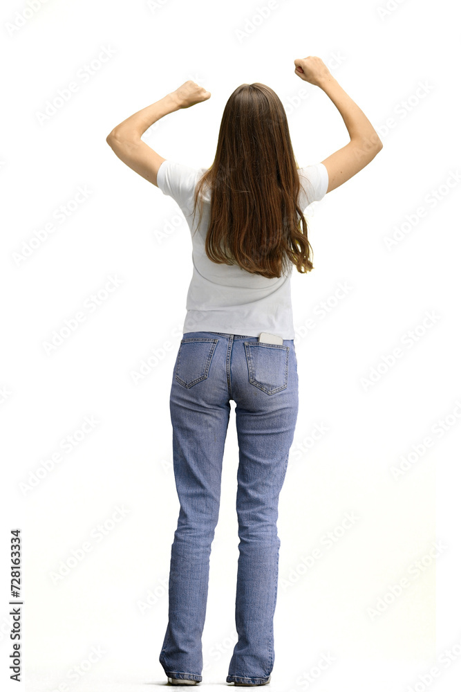 A woman, full-length, on a white background, raises her hands up A woman, full-length, on a white background, raises her hands up