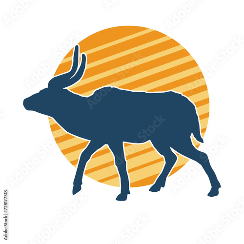 Silhouette of an wild antelope animal running.