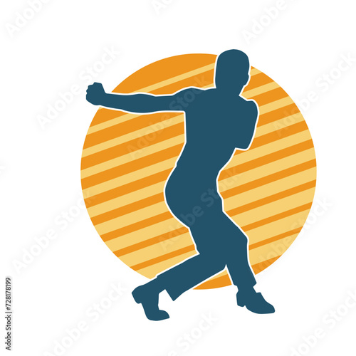 Silhouette of a man in oriental martial art pose. Silhouette of a male in martial art move.