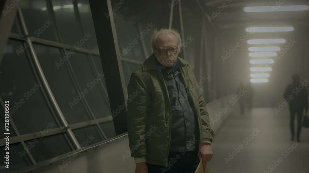 Elderly Homeless Man Suffering from Poverty Looking for Help at Train Station Elderly Homeless Man Suffering from Poverty Looking for Help at Train Station