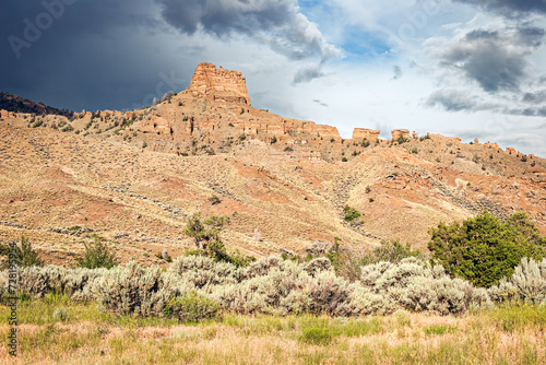 Storm clouds over canyon walls at sunrise in Wyoming, USA.