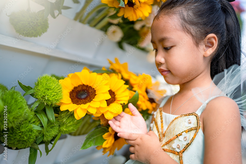 Naklejka premium child with flowers