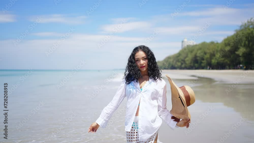 4K Happy woman travel nature ocean on summer beach holiday vacation. Attractive girl in casual clothing relax and enjoy outdoor lifestyle walking and relaxing on tropical island beach in sunny day. 4K Happy woman travel nature ocean on summer beach holiday vacation. Attractive girl in casual clothing relax and enjoy outdoor lifestyle walking and relaxing on tropical island beach in sunny day.