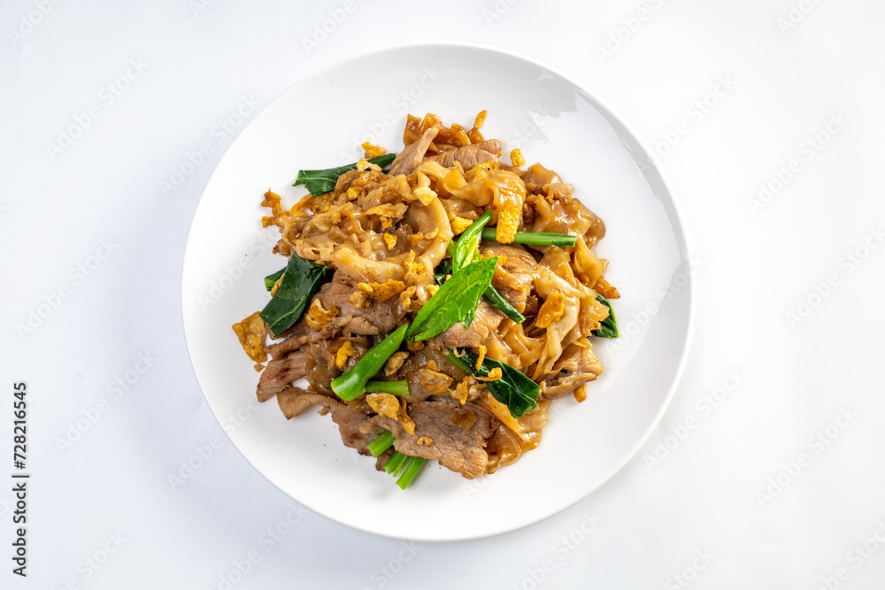 stir fried large noodles with soy sauce, dish of PAD SEE EW stir fried large noodles with soy sauce, dish of PAD SEE EW