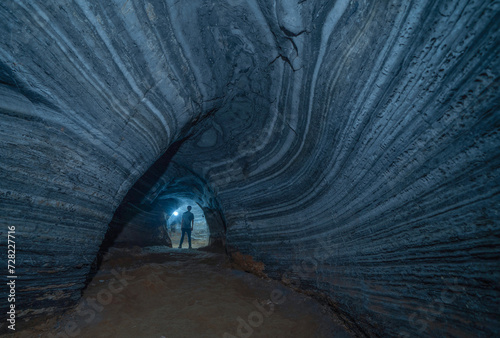 Blue cave with rocks, Mae Sot District, Tak, Thailand. Cave wall color pattern with natural landscape. Tourist attraction landmark. photo