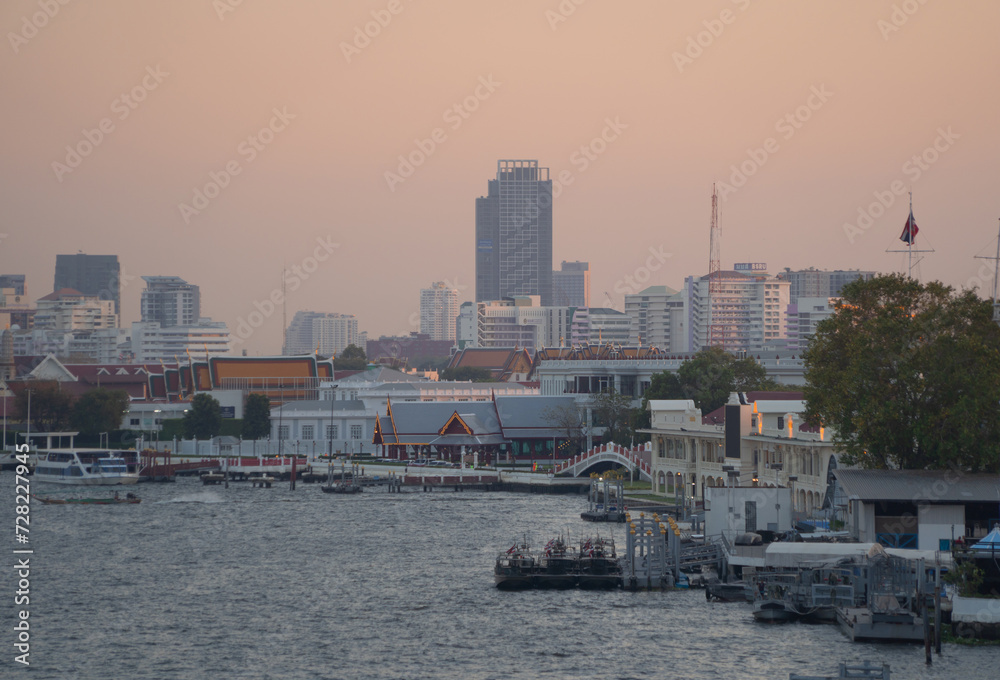 Aerial view of Bangkok Downtown Skyline with Chao Phraya River, Thailand. Financial district and business centers in smart urban city in Asia. Skyscraper and high-rise buildings.