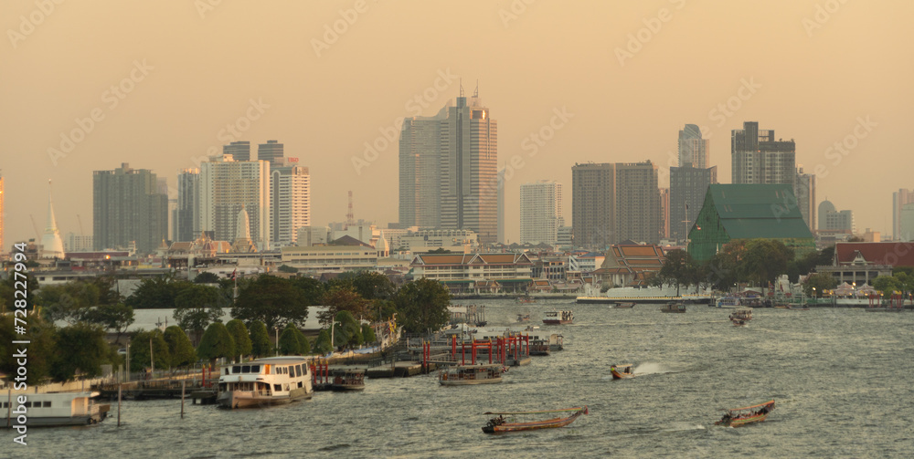 Obraz premium Aerial view of Bangkok Downtown Skyline with Chao Phraya River, Thailand. Financial district and business centers in smart urban city in Asia. Skyscraper and high-rise buildings.