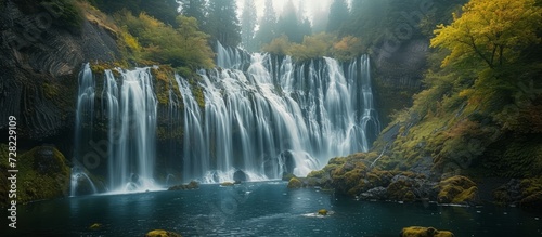 Waterfall in the Breathtaking Pacific Northwest: A Majestic Display of Cascading Water in the Enchanting Waterfall of the Pacific Northwest