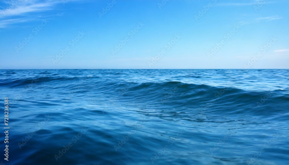 Waves of the open sea under the blue sky. horizon