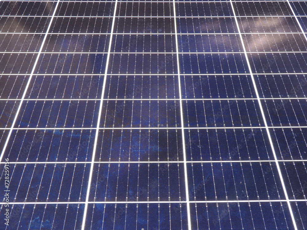 there are solar panels on the roof on sunny day there are solar panels on the roof on sunny day