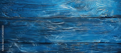 Blue Textured Wooden Background: Blank Canvas for Creativity on Blue Textured Wooden Background with a Unique Textured and Blank Blue Wooden Background photo