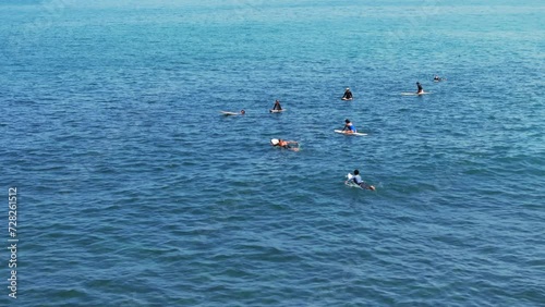 Surfing in Bingin Beach, Uluwatu Bali Island, Indonesia photo