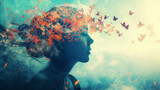 Surreal woman silhouette with butterflies and foliage.