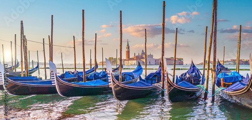 Venice cityscape and canal with gondolas