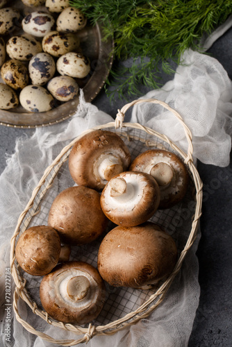 King mushrooms in a basket and quail eggs