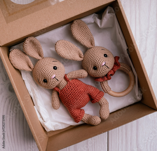 Handmade crocheted bunny toy, amigurumi, isolated. © O.B.