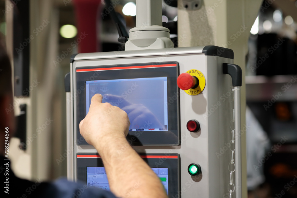 © gen_A - operator working with touchscreen control panel © gen_A - operator working with touchscreen control panel