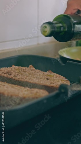 Artisan bread toasting with olive oil.