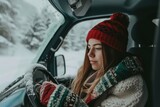 Young woman trading with crypto while on a winter road trip. 