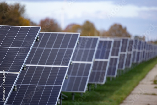 olar power station panels in rural landscape photo