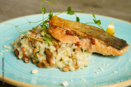 Grilled Salmon with risotto and chanterelle mushrooms