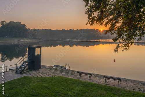 Germany, Hamburg, Lake in Stadtpark at sunset photo