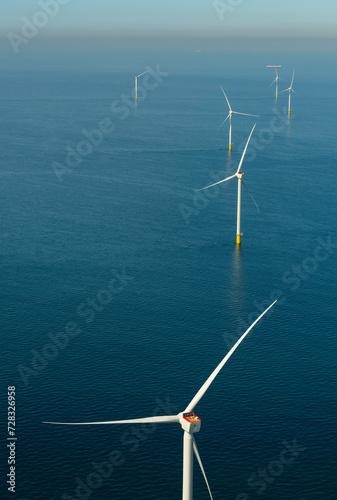 Netherlands, North Holland, IJmuiden, Aerial view of newly constructed offshorewind farmin North Sea photo