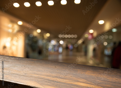 dark blurred background with empty table top, cafe restaurant windows. background for your product. High quality photo