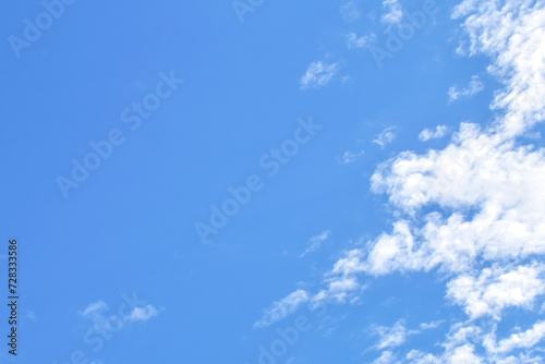 Blue sky with white fluffy cloud. Cumulus clouds background. Cloudscape morning sky. The concepts of freedom of life  never give up and positive though energy.