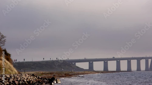 Soft Clouds Surrounding The Great Belt Bridge photo