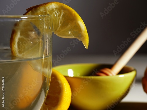 Making hot Lemon and honey for natural treatment of cold and flu 