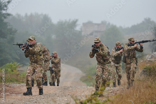 A disciplined and specialized military unit, donned in camouflage, strategically patrolling and maintaining control in a high-stakes environment, showcasing their precision, unity, and readiness for