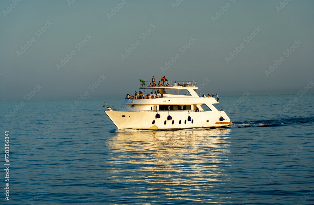 Tourist boat at sea with tourists