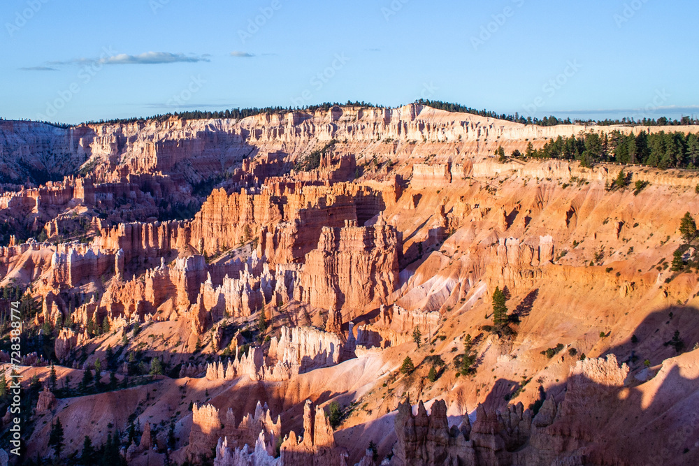 landscape in Bryce Canyon with magnificent Stone formation like Amphitheater, temples, figures in Morning light