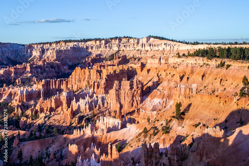 landscape in Bryce Canyon with magnificent Stone formation like Amphitheater, temples, figures in Morning light